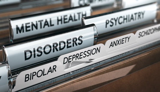 File dividers labeled with various mental health terms. 